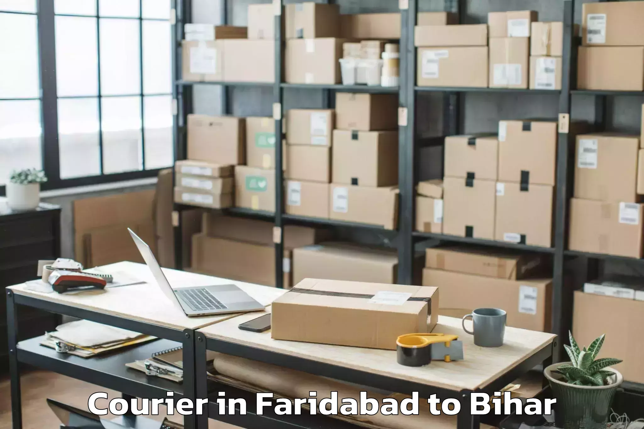 Get Faridabad to Marhaura Courier